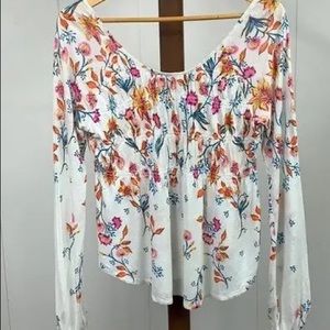 Free People long sleeved flowery blouse.